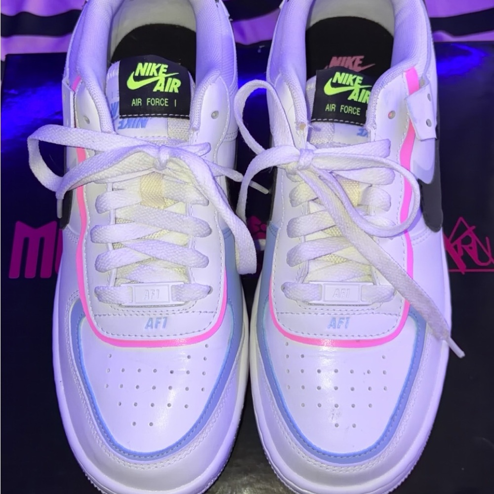Nike Kids White Sneakers with Pink and Light Blue Accents